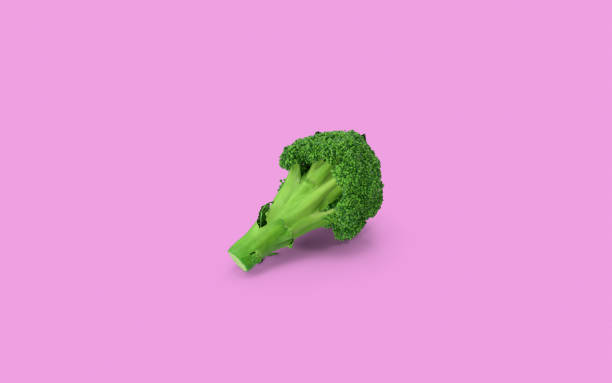 istock Broccoli On Pink Background with Copy Space 1169171118