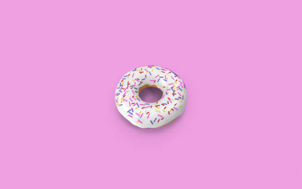 istock Donut On Pink Background with Copy Space 1169171874