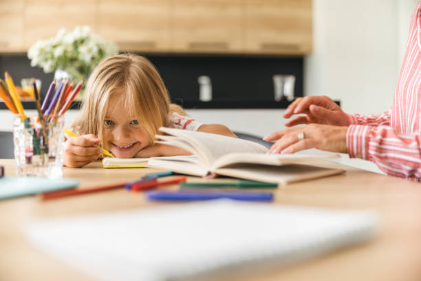 istock Having fun while studying at home stock photo 1169172647