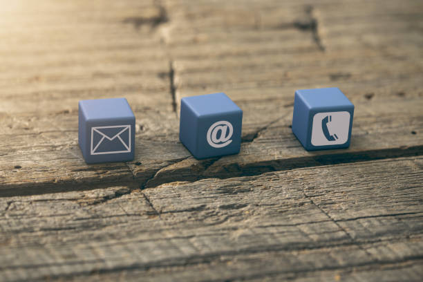 istock Contact Us Icons on Rustic Wood Copy Space 1169174880
