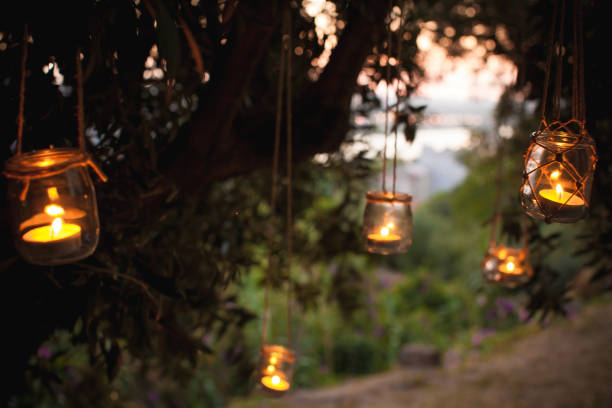 istock candles on the olive tree in the old city park 1169175577