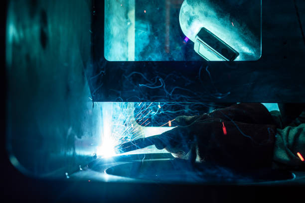 istock Welder working in factory 1169177064