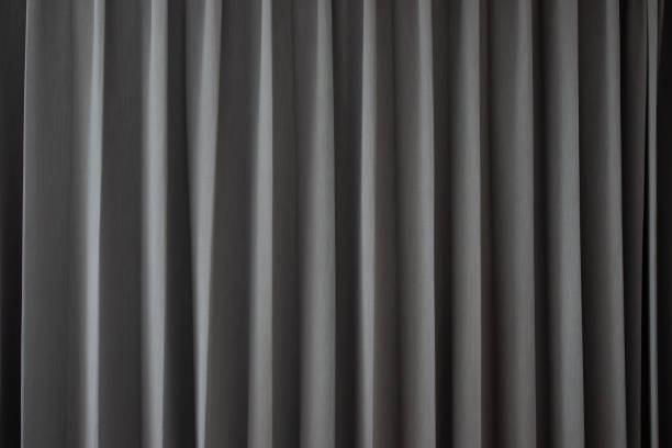 istock grey fabric curtain background and texture. 1169181509