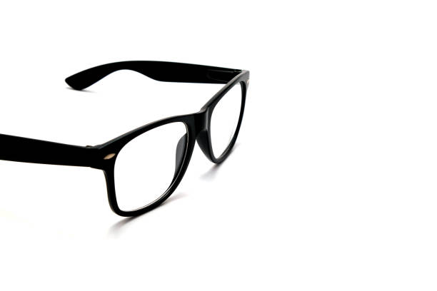 istock black glasses on white background, education concept 1169182507