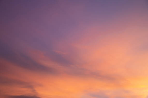 istock golden smooth cloud and purple sky in  evening twilight time. 1169182944