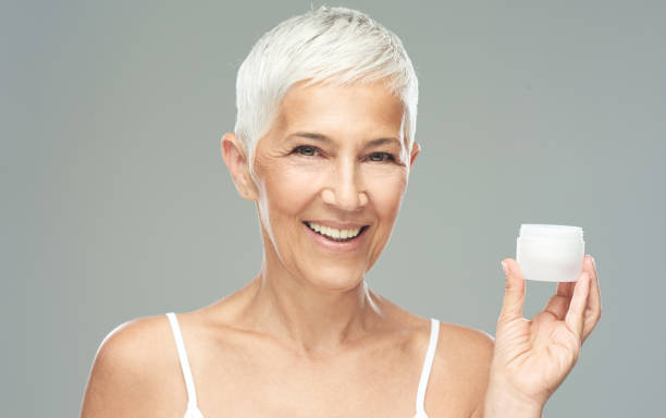 istock Woman posing with anti age cream. 1169194838