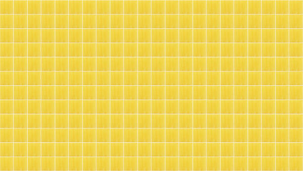 istock Yellow square ceramic tile texture background. Panoramic image of yellow tiled wall. 1169194896