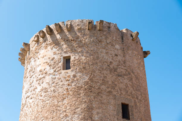 istock Tower in Sicilian port 1169196267