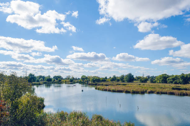 istock Beautiful summer landscape with a river and blue sky. 1169197171