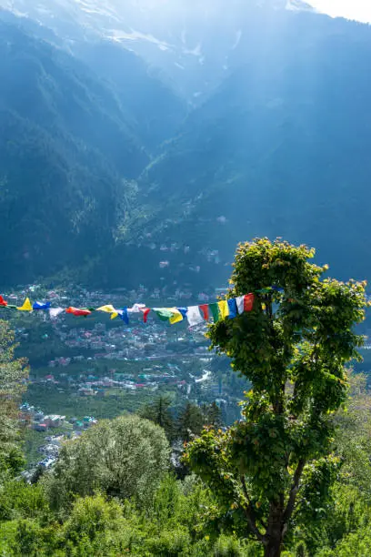 Photo of Budhist flags in the mountains near hamta