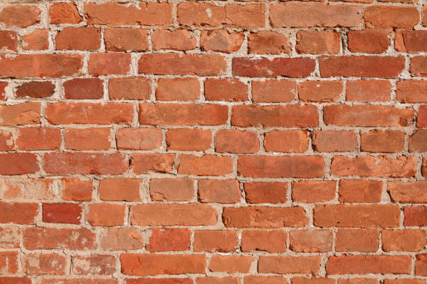 istock Background with brickwork pattern. Antique brickwork of baked clay brick. 1169203459