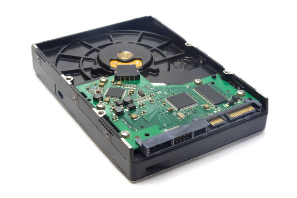 istock Old hard drive closeup on white background 1169205248