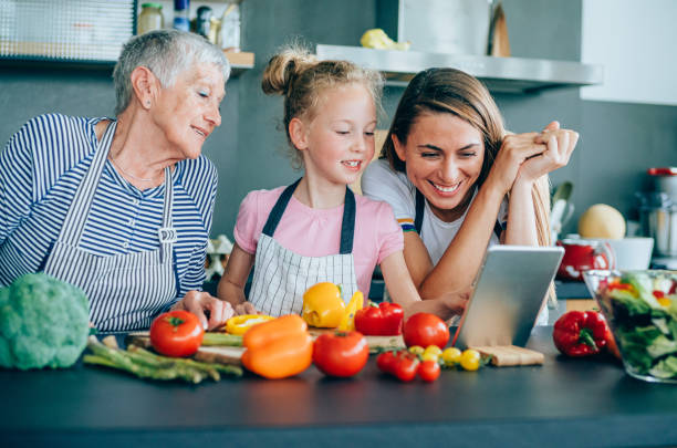 istock Modern multi-generation family in the kitchen 1169206298