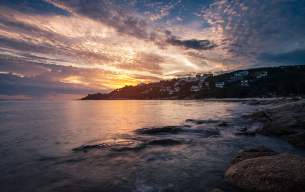 istock Sunset at sea with moody sky 1169211290