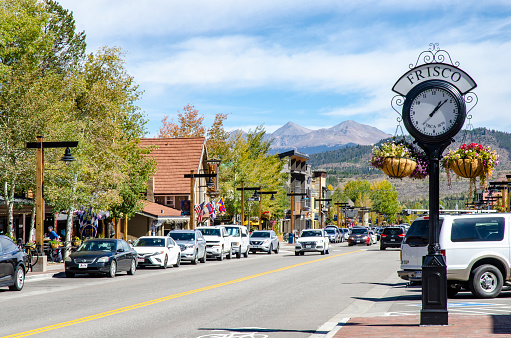 Frisco, Colorado, USA - September 27, 2018: Main Street runs through the town of Frisco, Colorado which was established in 1880 and built during the mining boom. Today, it is a popular town among skiers from around the world. Four major ski resorts are located in close proximity to Frisco: Copper Mountain, Breckenridge, Keystone, and Arapahoe Basin. The town attracts many visitors each year and offers many shops and restaurants. A large reservoir, Lake Dillon, is also located by the town and includes a marina, park and centers for outdoor activities.