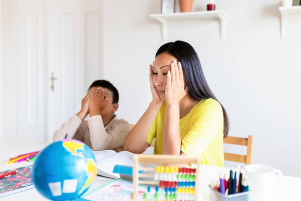 istock Stressed Mother and Son Frustrated Over Failure Homework 1169215304