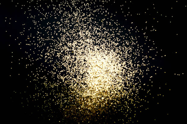 istock Black background with golden sparkles. Blurred  effect. Concept for festive background or for project 1169220162