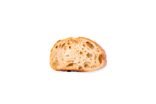 A piece of white bread isolated on a white background. Top view.