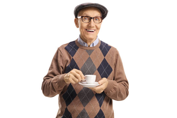 istock Cheerful elderly man with a cup of espresso coffee 1169224937