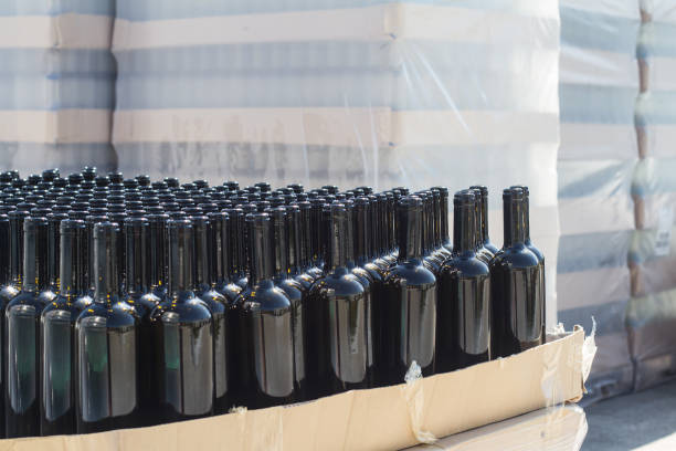 istock black wine bottles on pallets in outside storage area 1169228587