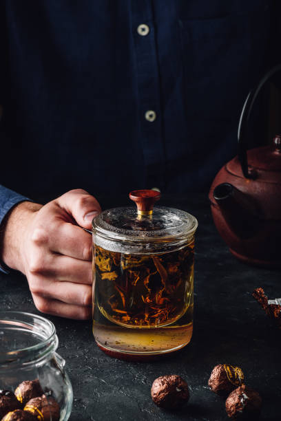 istock Steeping red tea in glass mug 1169230600
