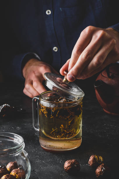 istock Steeping red tea in glass mug 1169230609