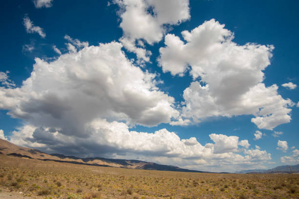 istock clouds cast shadows hills in vast California desert landscape 1169231974