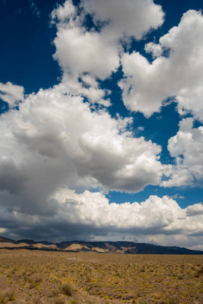 istock clouds cast shadows hills in vast California desert landscape 1169231976