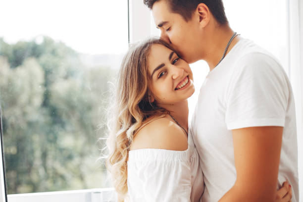 istock Beautiful couple at home 1169234352