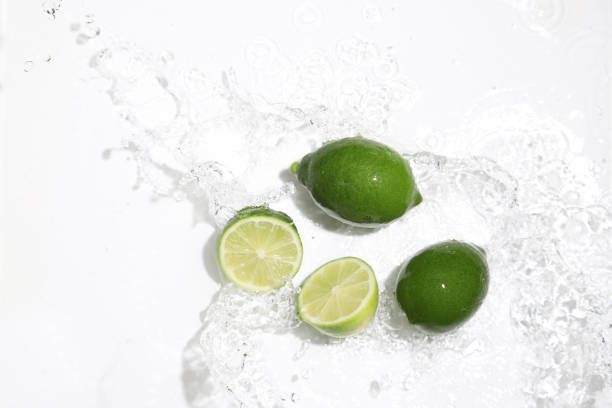 istock the limes with the water splash 1169235212