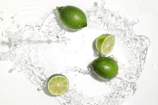 istock the limes with the water splash 1169235226
