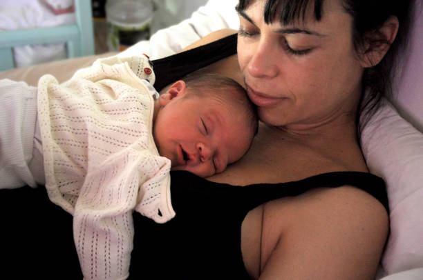 istock mother and newborn baby 1169237333