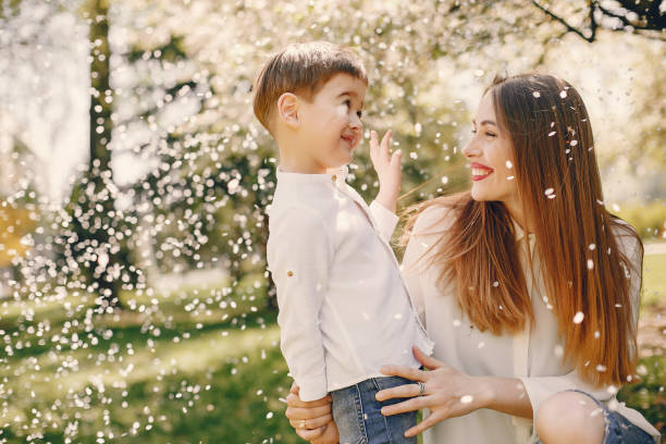 istock Mother with son playing in a summer park 1169237439