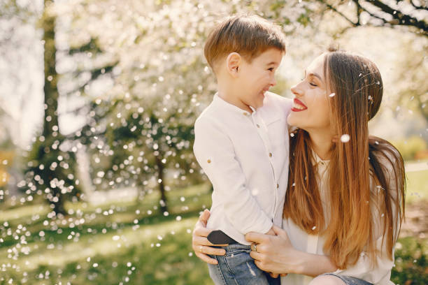 istock Mother with son playing in a summer park 1169237471