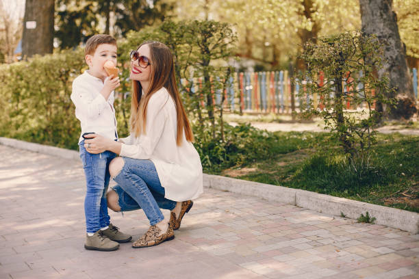 istock Mother with son playing in a summer park 1169237479