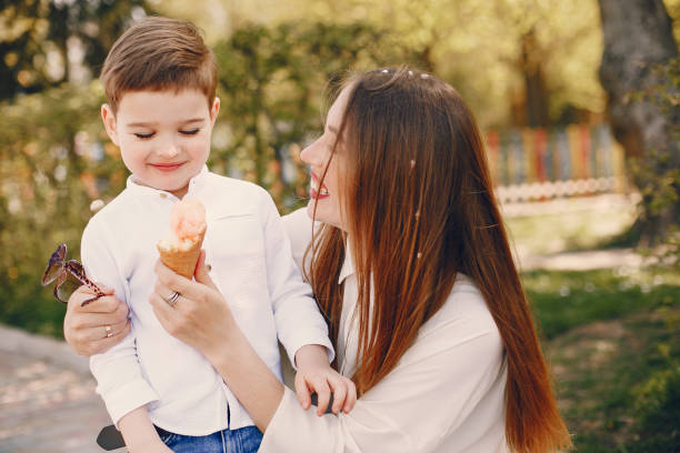 istock Mother with son playing in a summer park 1169237497