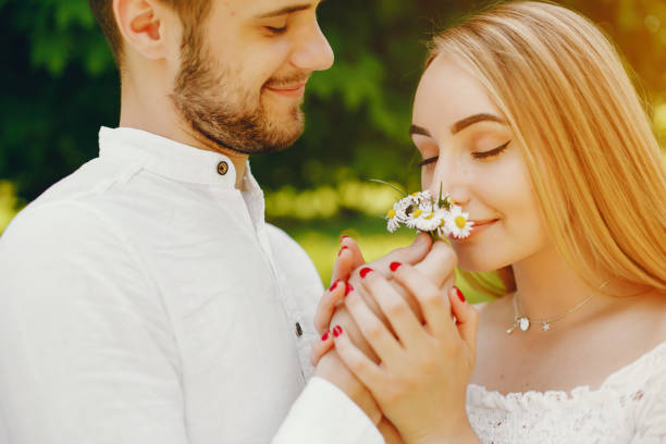istock elegant couple in a forest 1169243859