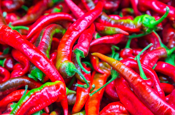 フルフレームファーマーズマーケットジミーナルデッロペッパーペッパー - pepper bell pepper market spice ストックフォトと画像