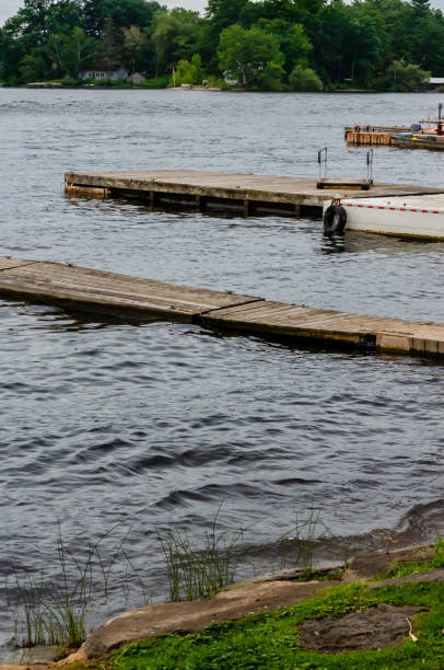 istock Three parallel docks near an island in the Thousand Islands, St. Lawrence River 1169245645