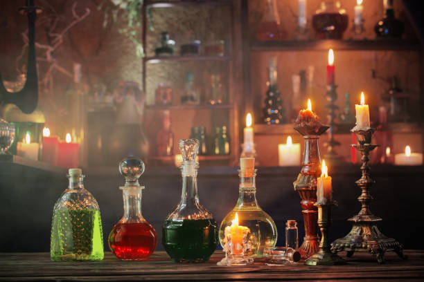 istock magic potions in bottles on wooden background 1169247372