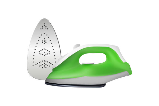 Green electric iron. Green electric iron. Vector illustration. Home electrical appliances. iron steam stock illustrations