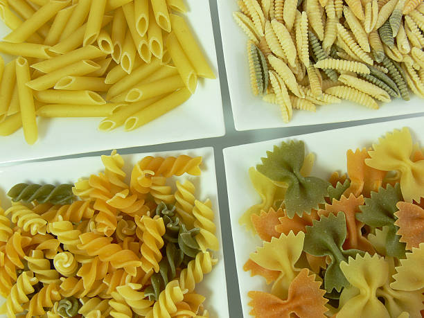makaron italiana - penne rigatoni pasta tomato pasta zdjęcia i obrazy z banku zdjęć