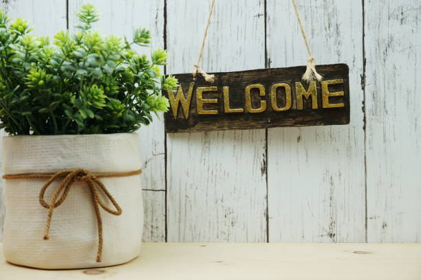 istock Welcome sign and home decor with space copy background 1169267883