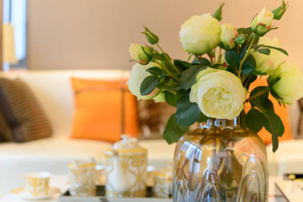 istock beautiful artificial roses in front of sofa inside a living room 1169272301