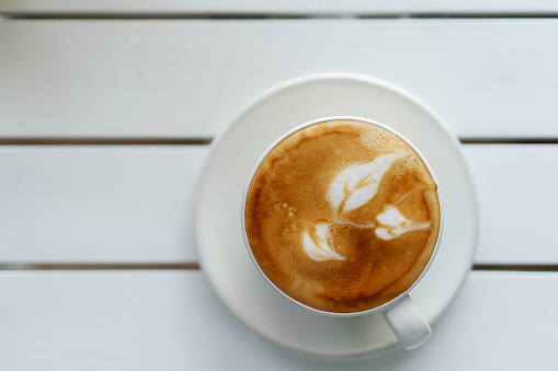 latte coffee, with leaf pattern