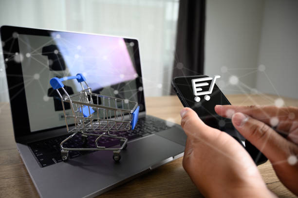 istock Business people use Technology E-commerce Internet Global Marketing Purchasing Plan and Bank Ecommerce Concept 1169273916