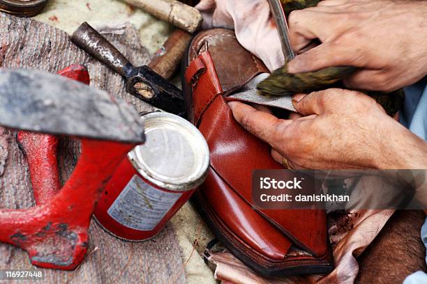 Fixing Sandal Stock Photo - Download Image Now - Afghan Ethnicity, Blue-collar Worker, Boot