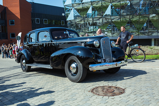 City Riga, Latvian republic. Retro car party. Oldtimer cars at the motor museum. Urban city view. 17 August 2019.