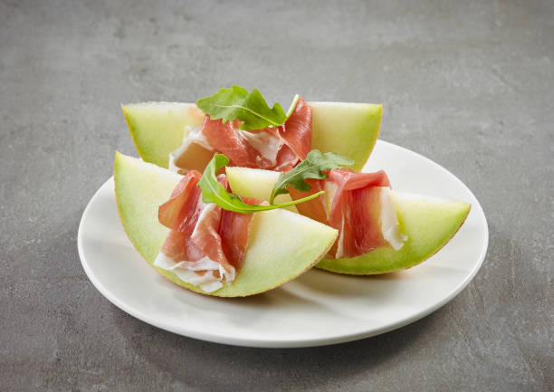 istock Melon slices with prosciutto ham 1169284244