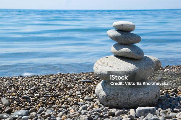 Five Balanced Stones On A Beach Stock Photo - Download Image Now - Abstract, Backgrounds, Balance